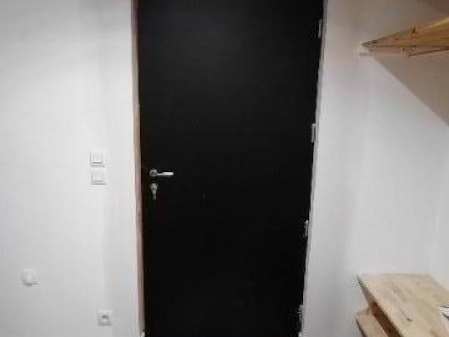 Remplacement d'une porte d'entrée sur une maison ossature bois
